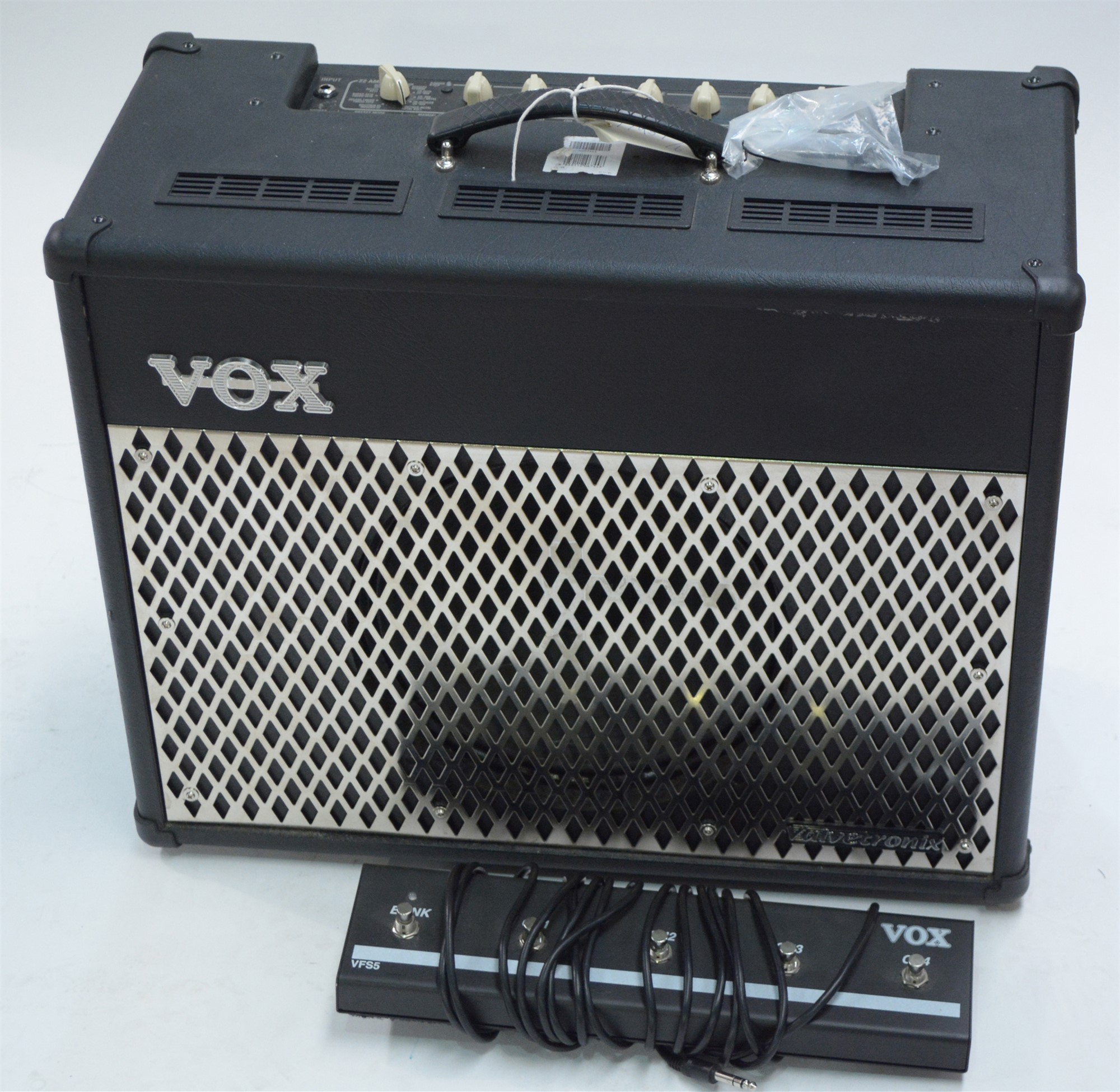 Lot 83 Vox VT50 guitar amplifer; and a foot pedal.