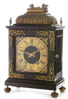 Lot 748 - An 18th Century style ebonised and gilt bronze bracket clock; and associated bracket.