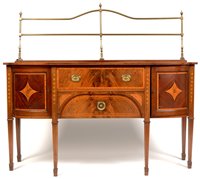 Lot 758 - An early 20th Century mahogany and satinwood banded breakfront sideboard.