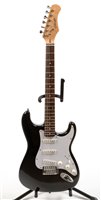 Lot 201 - A Stagg Strat Style Guitar and stand