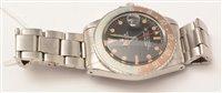 Lot 469 - Rolex GMT Master: a gentleman's stainless steel bracelet watch.