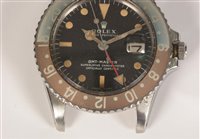 Lot 469 - Rolex GMT Master: a gentleman's stainless steel bracelet watch.