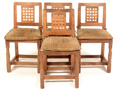 Lot 849 - Robert "Mouseman" Thompson, Kilburn: a set of four oak dining chairs.