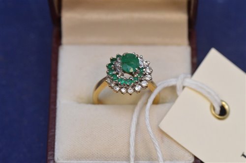 Lot 717 - Emerald and diamond ring