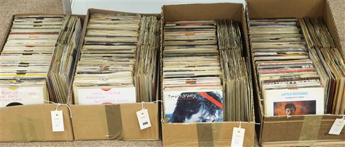 Lot 399 - Four boxes of 7" vinyl singles.