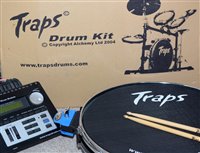 Lot 210 - Traps electronic drum kit and accessories.