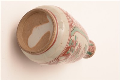 Lot 19 - A 19th Century Chinese glazed stoneware small vase or wine bottle.