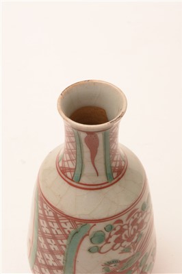 Lot 19 - A 19th Century Chinese glazed stoneware small vase or wine bottle.