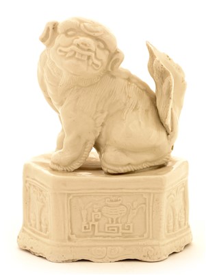 Lot 8 - A Chinese blanc de chine porcelain figure of a Buddhist lion of fu dog.