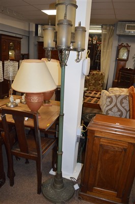 Lot 690 - An Art Deco standard lamp and shades