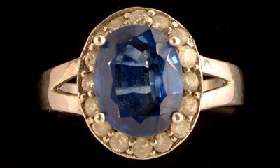 Lot 584 - Sapphire and diamond ring