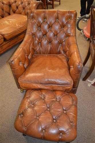 Lot 1086 - leather armchair and stool