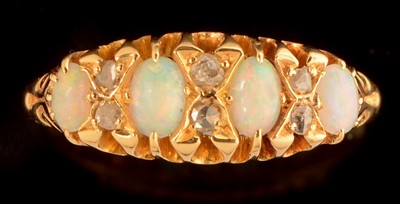 Lot 588 - Opal and diamond ring