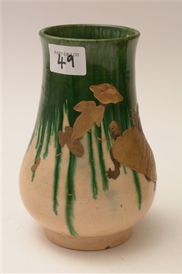 Lot 49 - An unusual pair of early 20th Century Japanese earthenware vases.