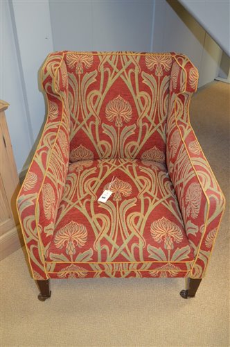 Lot 940 - Wing back armchair