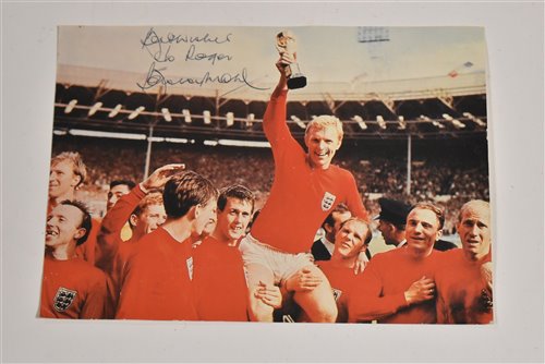 Lot 252 - Photograph signed by Bobby Moore