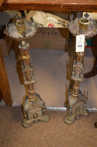Lot 1048 - Pair of religious candlesticks
