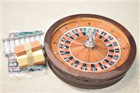 Lot 109 - John Huxley roulette wheel, chips, stand and mat