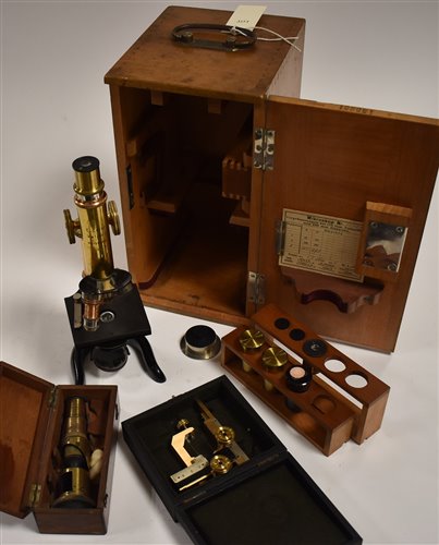 Lot 70 - Leitz microscope, stage mount and travelling microscope