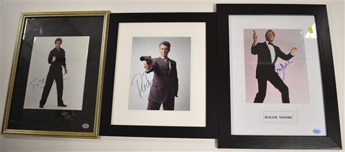 Lot 213 - Signed James Bond photographs