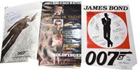 Lot 219 - James Bond signed Posters