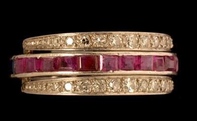 Lot 595 - Sapphire, ruby and diamond swivel eternity ring