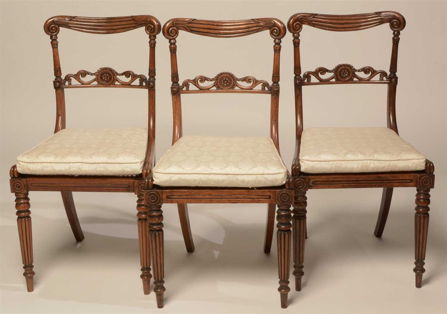 Lot 842 - A set of eight Regency rosewood dining chairs.