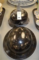 Lot 584 - Pickelhaube and ARP helmets