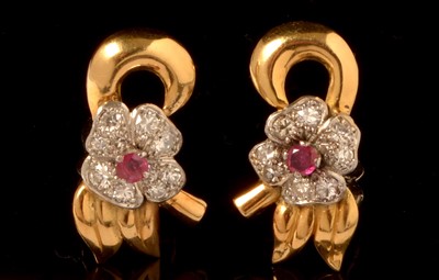 Lot 563 - A pair of ruby and diamond earrings