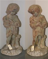 Lot 760 - A pair of garden ormanets.