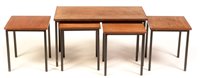 Lot 75 - A teak and black painted metal coffee table and four smaller occasional tables