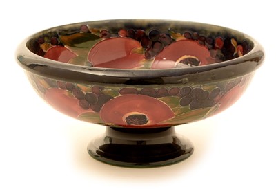 Lot 125 - William Moorcroft: a 'Pomegranate' pattern footed bowl.