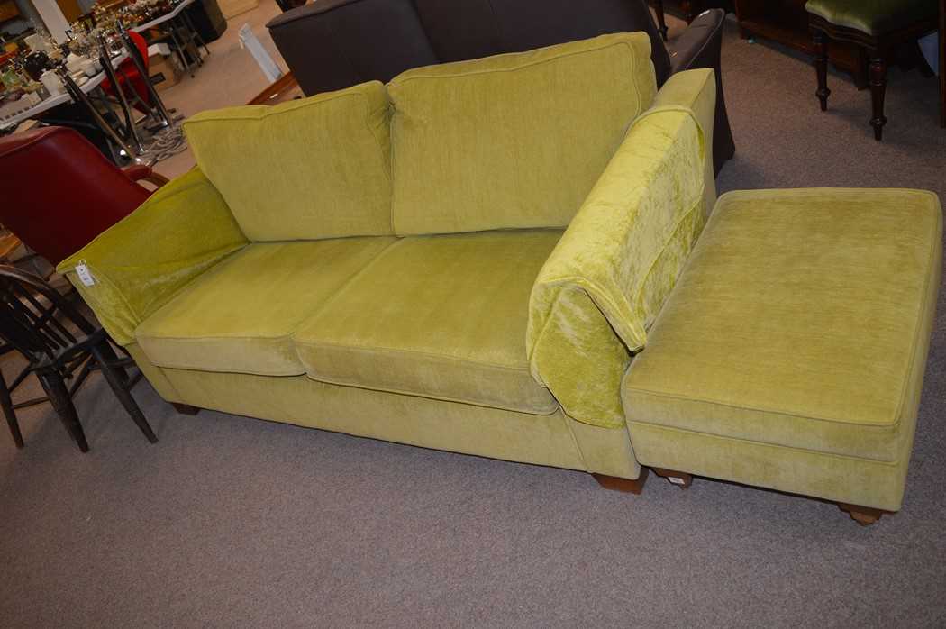 Lot 584 - Sofa and footstool