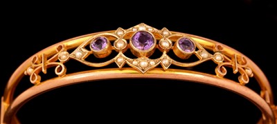 Lot 605 - Amethyst and pearl bangle