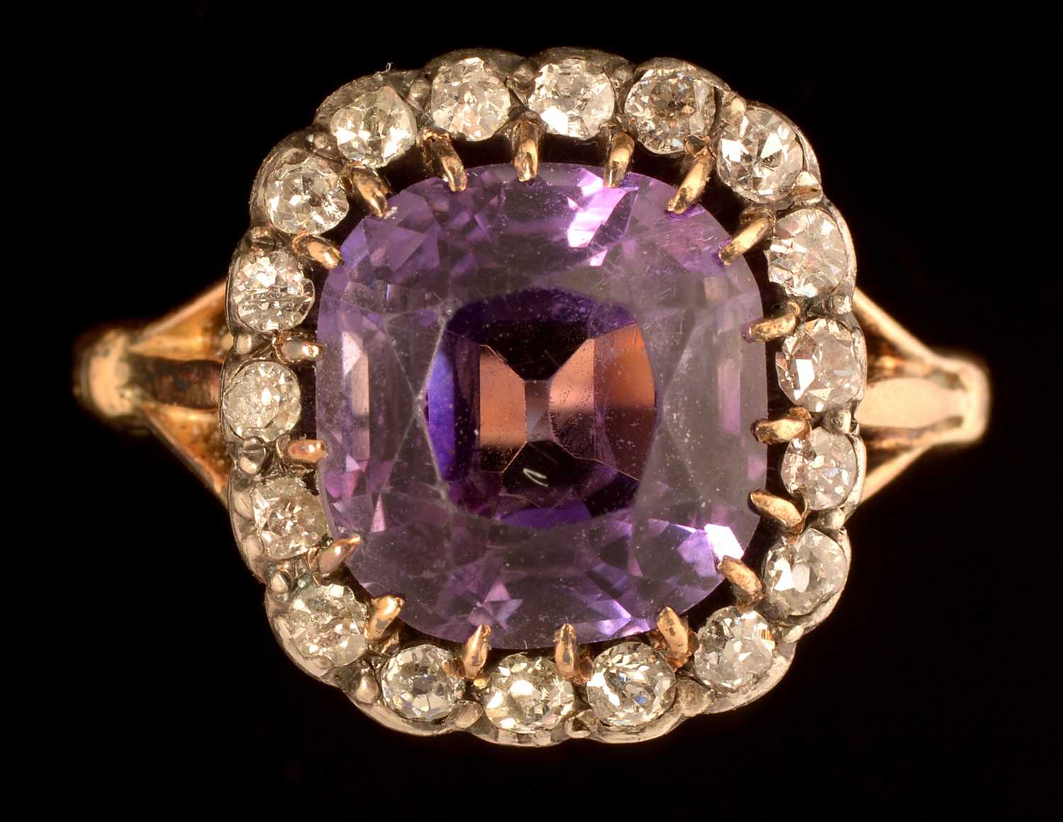Lot 620 - Amethyst and diamond cluster ring