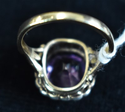 Lot 620 - Amethyst and diamond cluster ring