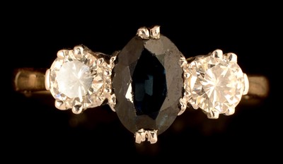 Lot 633 - Sapphire and diamond ring
