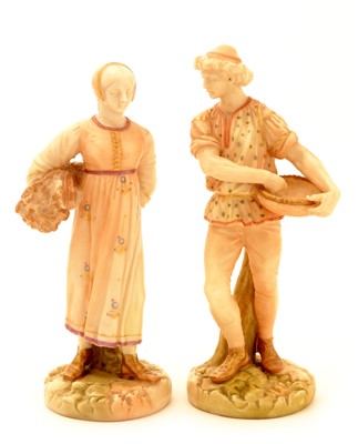 Lot 123 - A pair of Royal Worcester blush ivory figure sowers.