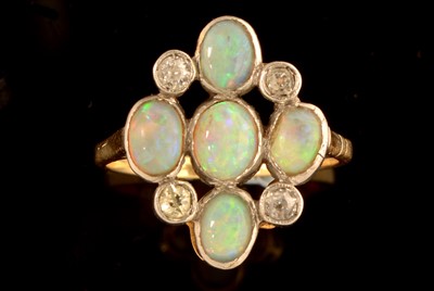 Lot 639 - Opal and diamond ring