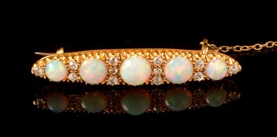 Lot 641 - Opal and diamond brooch