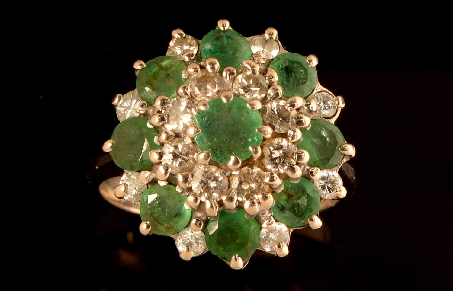 Lot 112 - Emerald and diamond cluster ring