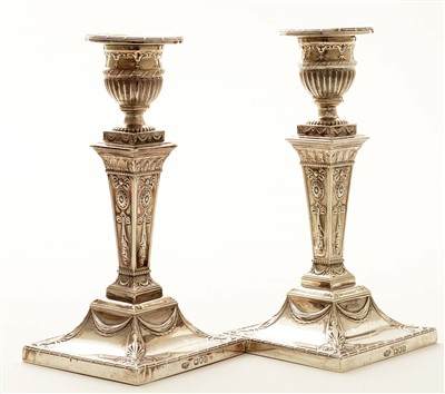 Lot 505 - Pair of silver candlesticks