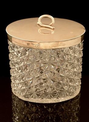 Lot 484 - Silver covered cut glass biscuit barrel