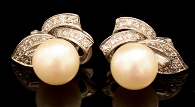 Lot 650 - Pair diamond and pearl earrings