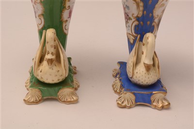 Lot 102 - Two 19th Century porcelain swan cornucopia vases.