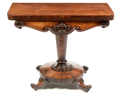 Lot 853 - An early 19th Century rosewood turnover top tea table.