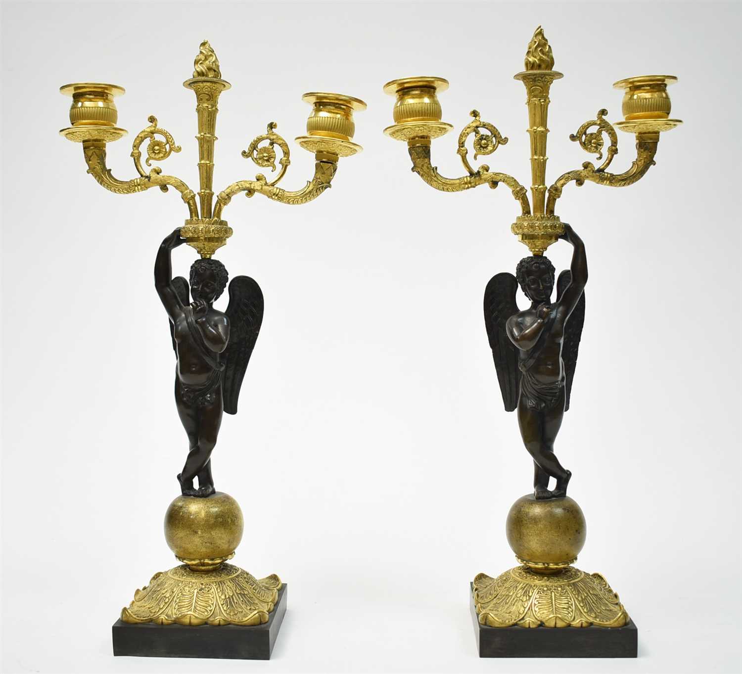 Lot 442 - A pair of candelabra