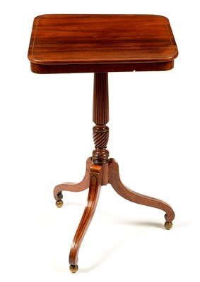 Lot 852 - A rosewood and brass inlaid tripod table.