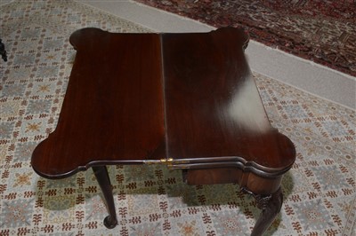 Lot 767 - A George III mahogany triple top tea and card table.