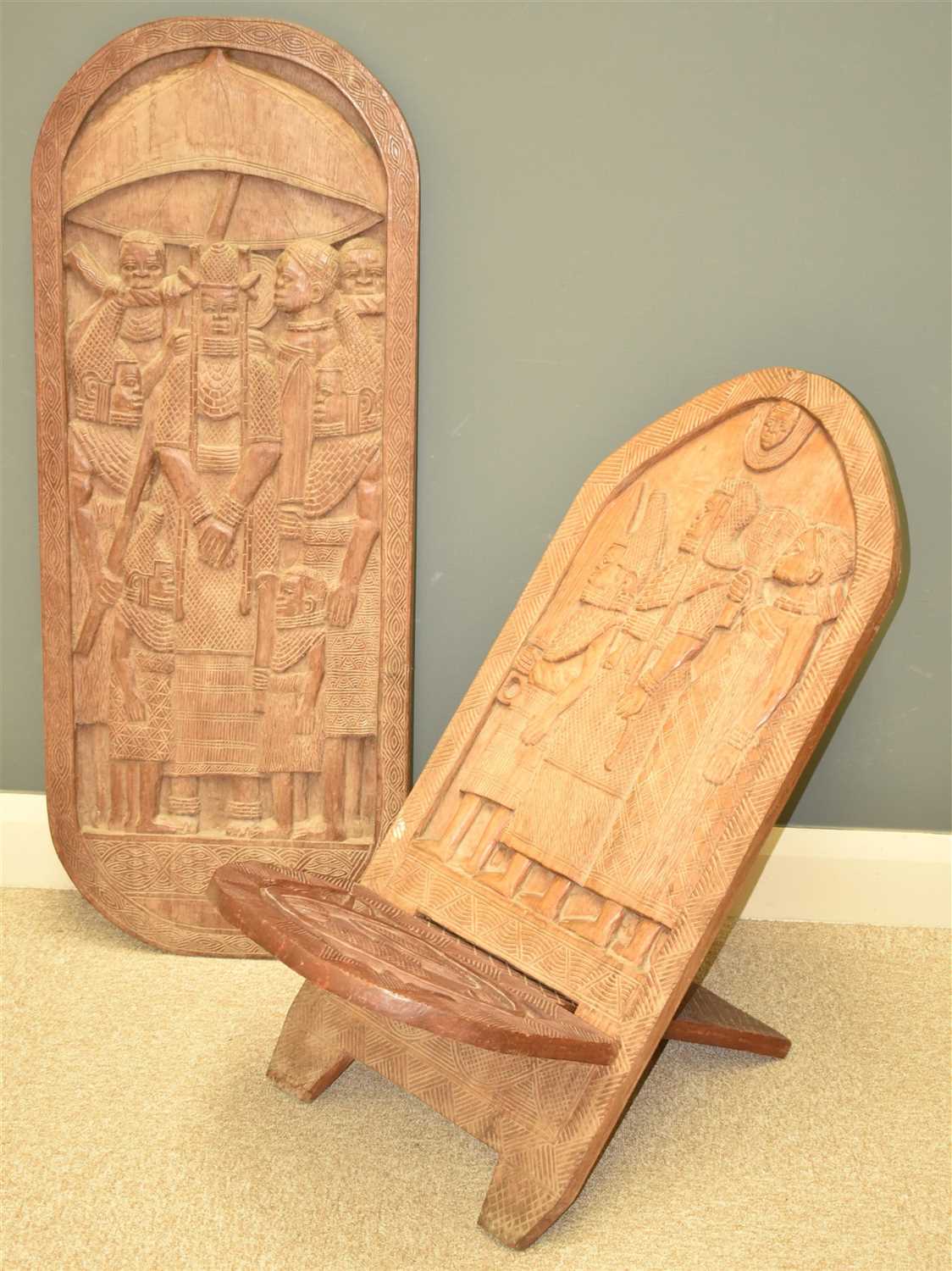 Lot 287 - Carved Benin tribe chair and wall panel